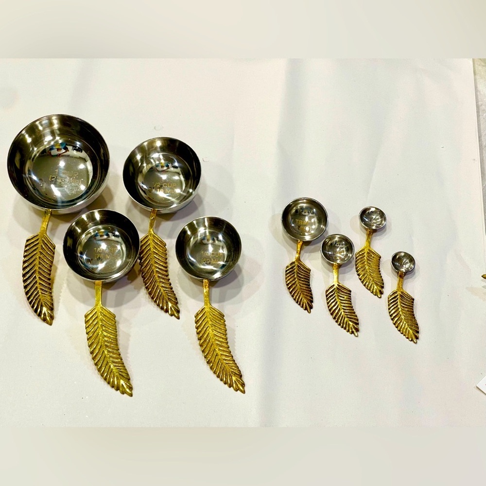 NEW metal measuring cups and spoons, gold leaf handles, 4 pieces of each set!